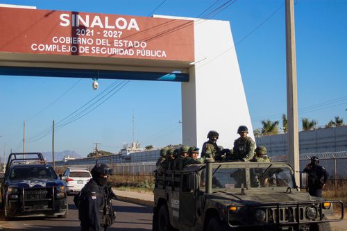 Police and military on patrol in Sinaloa state, Mexico.