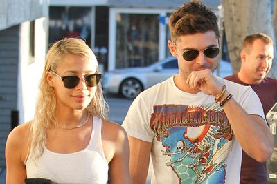 After being dissed and dismissed by ex-girlfriend Michelle Rodriguez, Zac Efron's moved on to aspiring model Sami Miro... and is reportedly "smitten" by her. Lucky Sami. <br/><br/>The loved-up couple first sparked dating rumours back in October, after being introduced by mutual friend Dylan Penn. After enjoying a romantic getaway to Denmark last month (again, lucky Sami), the pair celebrated Zefron's 27th birthday at a bar in Amsterdam... and have since been spotted couple car shopping. <br/><br/>Please don't elope yet Zac!