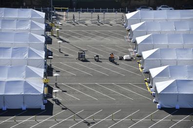 An aerial view shows COVID-19 vaccination tents set up in the north of the Toy Story parking lot at the Disneyland Resort on Tuesday, Jan. 12, 2021, in Anaheim, CA.(Photo by Jeff Gritchen, Orange County Register/SCNG)