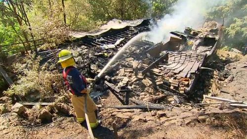 The bodies of two people were pulled from the wreckage of the fire at the Bayview home. They are yet to be identified. (9NEWS)