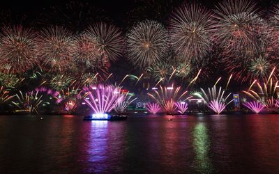 Fireworks light up Hong Kong's iconic skyline as revellers celebrate the arrival of 2019.