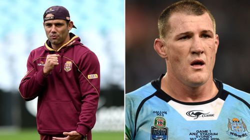 Captain Cameron Smith (left) will lead the Maroons against Blues captain Paul Gallen and the NSW side. (AAP)