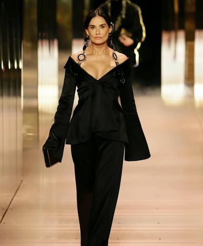 Demi Moore walks the Paris Fashion runway show.