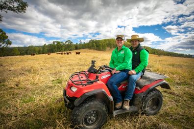 Bianca and Dave farm on vehicle on farm