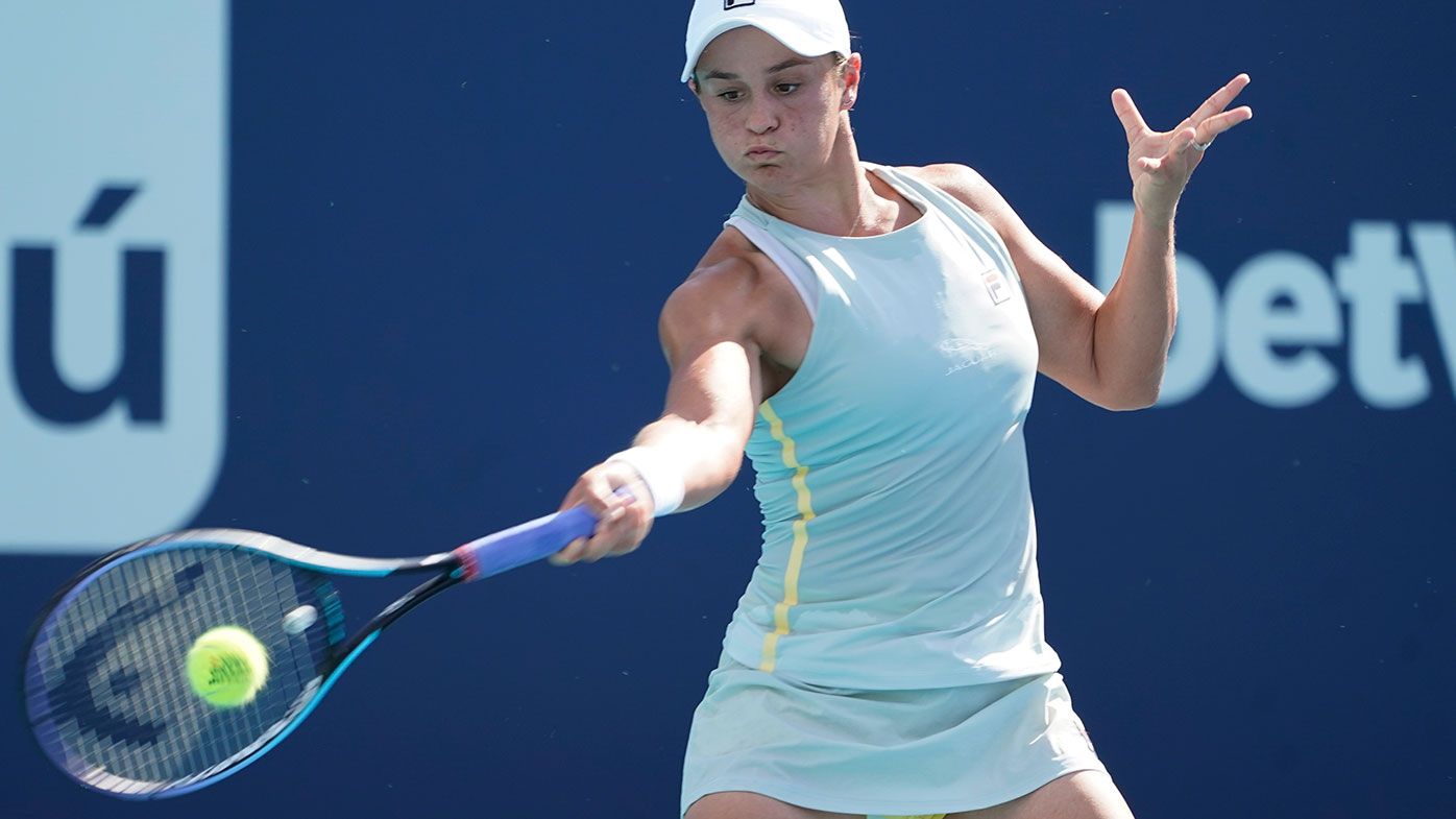 Ashleigh Barty, of Australia, returns to Kristina Kucova, of Slovania, during the Miami Open tennis tournament.