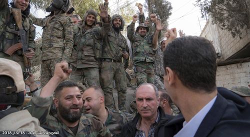 President Assad was cheered by armed forces, who chanted his praises. (AAP)
