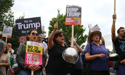 Protesters bang drums. Picture: Getty