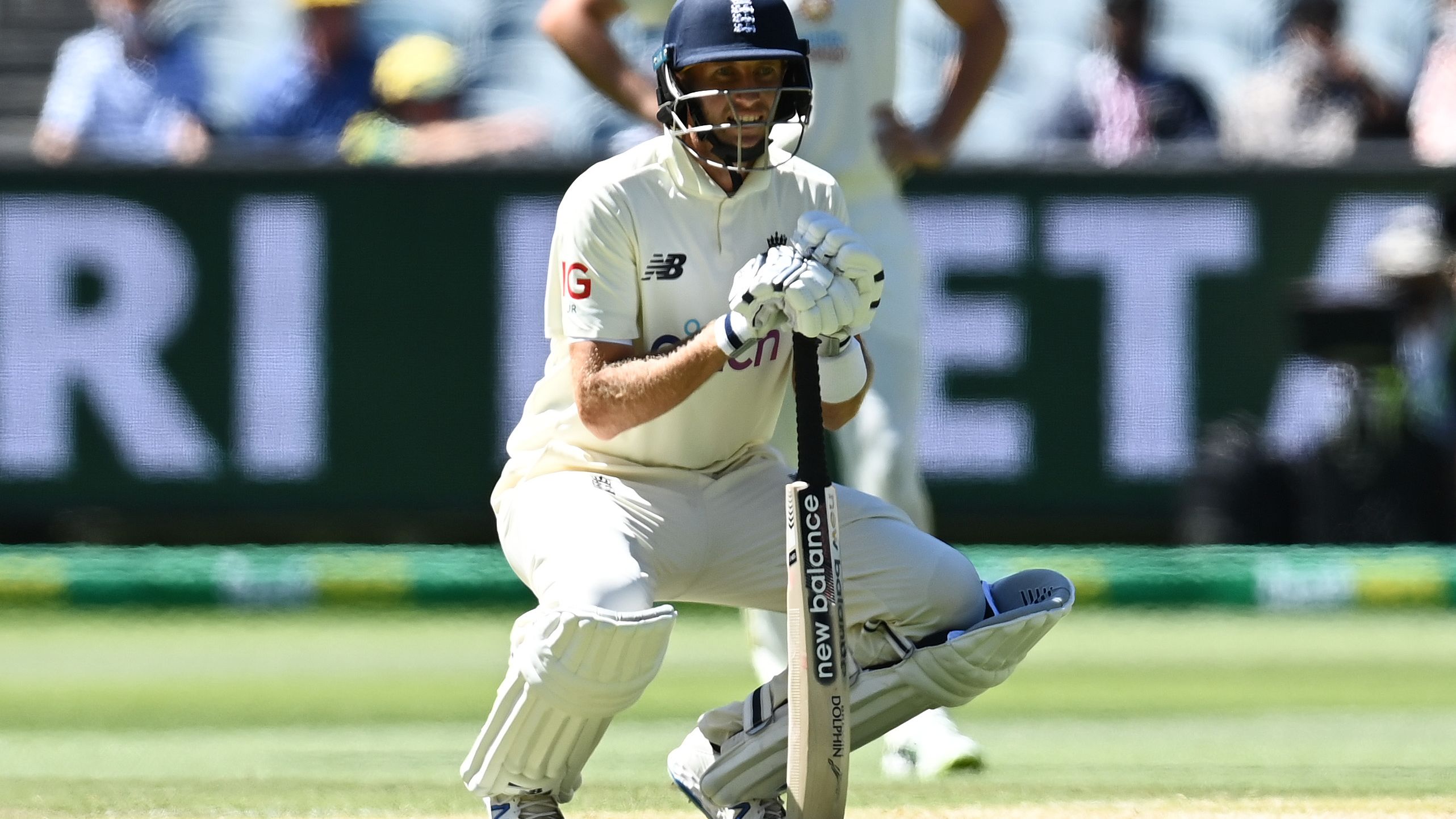 Joe Root of England recovers after being struck by a ball after a delivery from Pat Cummins during day three of the Third Test match in the Ashes series.