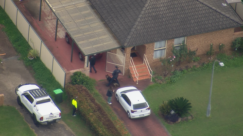Police searching St Andrews in Sydney's south-west for an escaped detainee.