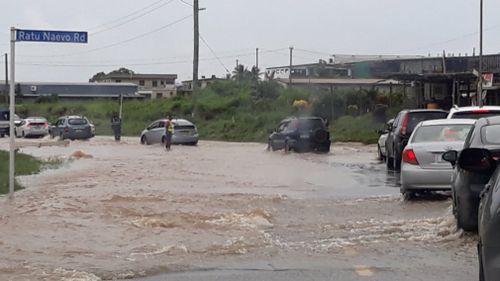 Roads and cars remain underwater as heavy rainfall continues to lash Fiji as the category 1 cyclone passes. Picture: Halitesh Datt.