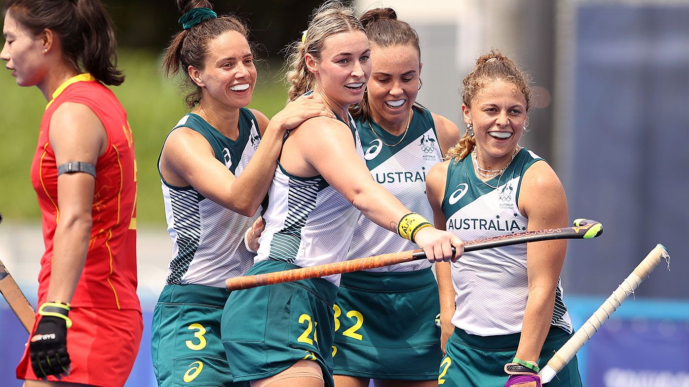  Ambrosia Malone #2 of Team Australia is congratulated by her teammates after scoring a goal against Team China during the Women&#x27;s Preliminary Pool B match on day three of the Tokyo 2020 Olympic Games at Oi Hockey Stadium on July 26, 2021 in Tokyo, Japan. (Photo by Francois Nel/Getty Images)