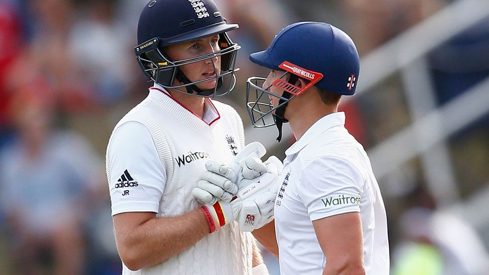 James Taylor (R) congratulated Joe Root during his innings for England. (Getty)