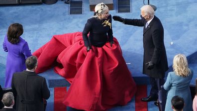 President-elect Joe Biden greets Lady Gaga during the 59th Presidential Inauguration at the U.S. Capitol in Washington, Wednesday, Jan. 20, 2021.