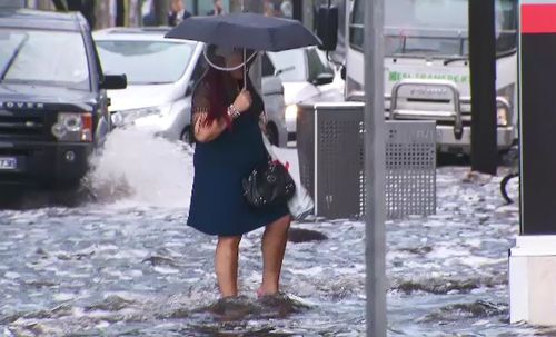 People were left standing in flowing water as the rain hit. 