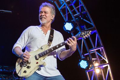 Van Halen, band, guitarist Eddie Van Halen, on stage, perform