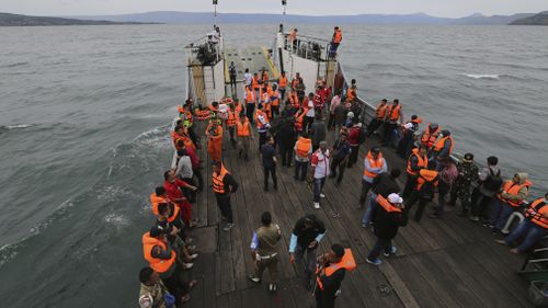 An Indonesia search and rescue team searches for a ferry which sank on Monday in lake Toba. Picture: AP