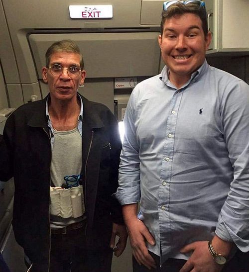 British man Ben Innes, 26, poses with the hijacker on board an EgyptAir flight