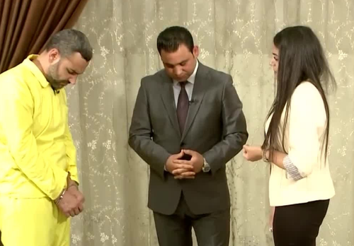 A Yazidi woman has appeared on Iraqi television to confront the IS fighter who kidnapped and raped her when she was 14.