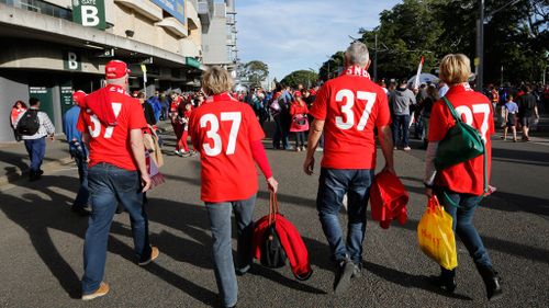 A large number of Swans fans arrived wearing Adam Goodes' number 37. (AAP)