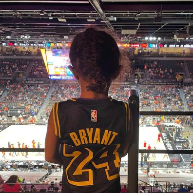 Vanessa Bryant with daughters Bianka and Capri at WNBA game in Las Vegas.