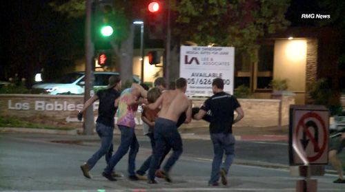 As the shots rang out from inside the California bar however, terrified customers were seen shattering windows in an attempt to escape.