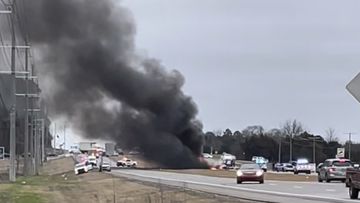This image made from video provided by Angelica Hart shows the scene of a Black Hawk helicopter crash Wednesday, Feb. 15, 2023, in the unincorporated community of Harvest, Ala. U.S. military officials say two people on board the helicopter, which was from the Tennessee National Guard, were killed.
