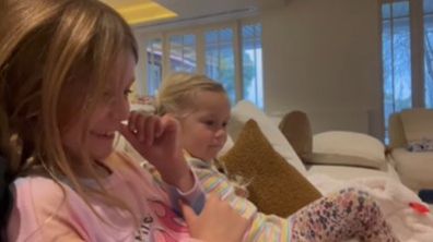 Carrie Bickmore's daughters watching Bluey.
