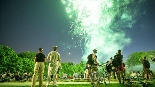 People lighting fireworks in Trinity Bellwoods Park on Canada Day (Getty)