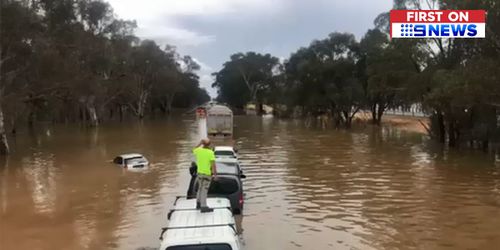 Authorities have been called in to airlift standard motorists from the roofs of their vehicles