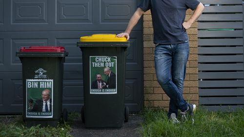 Peter Rickwood has anti Scott Morrison / Barnaby Joyce stickers on his bins. The Philip Ruddock-led Hornsby Council has sent him a letter threatening not to collect his rubbish if the stickers aren't removed. 22nd March 2022, Photo: Wolter Peeters, The Sydney Morning Herald.