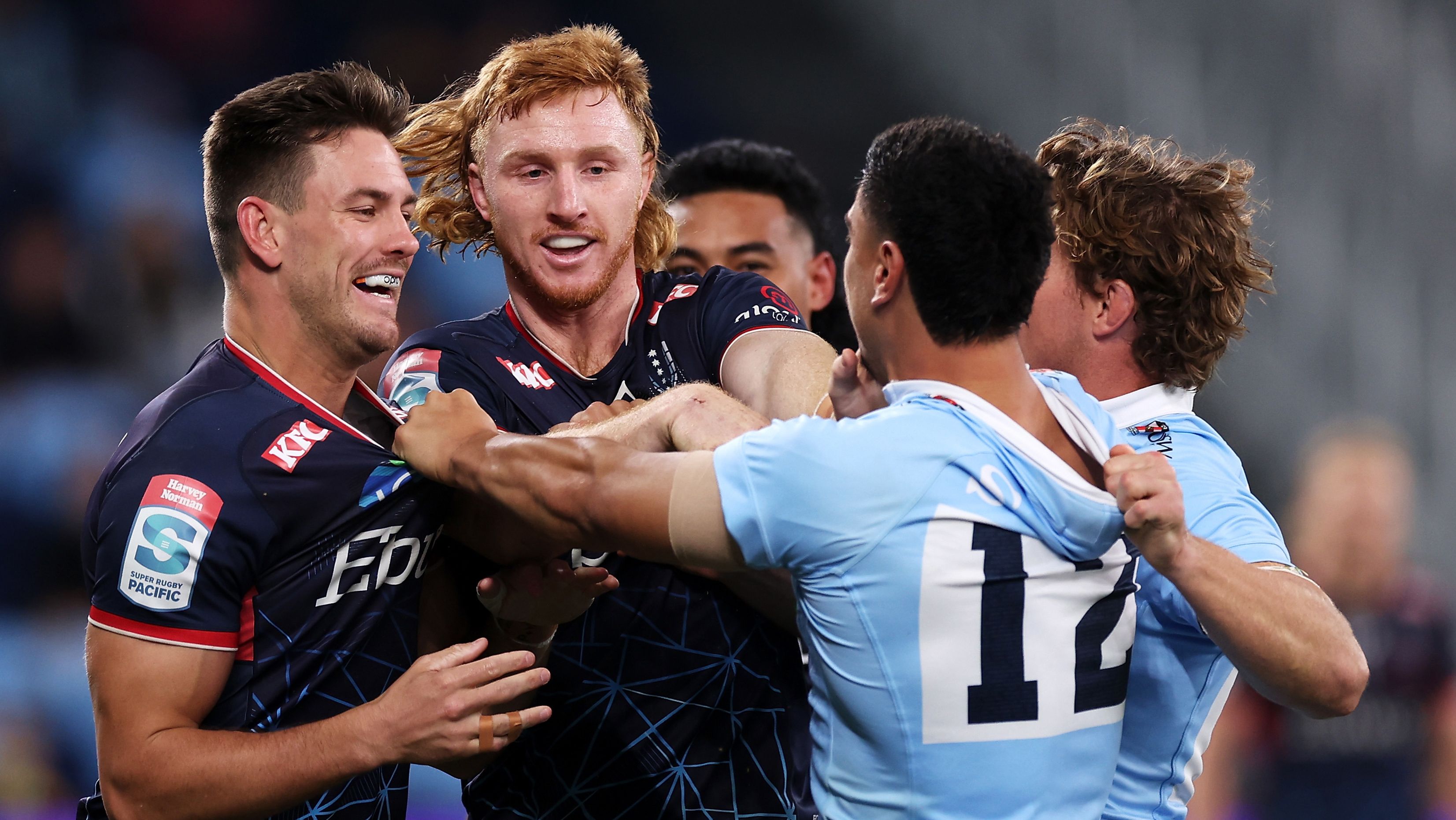 SYDNEY, AUSTRALIA - MAY 13: Lachie Anderson and Brad Wilkin of the Rebels scuffle with Lalakai Foketi and Michael Hooper of the Waratahs during the round 12 Super Rugby Pacific match between NSW Waratahs and Melbourne Rebels at Allianz Stadium, on May 13, 2023, in Sydney, Australia. (Photo by Mark Kolbe/Getty Images)