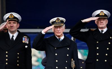 L-R: Commander Will Peters, Prince Charles, Captain Roger Readwin at Britannia Royal Naval College, Dartmouth