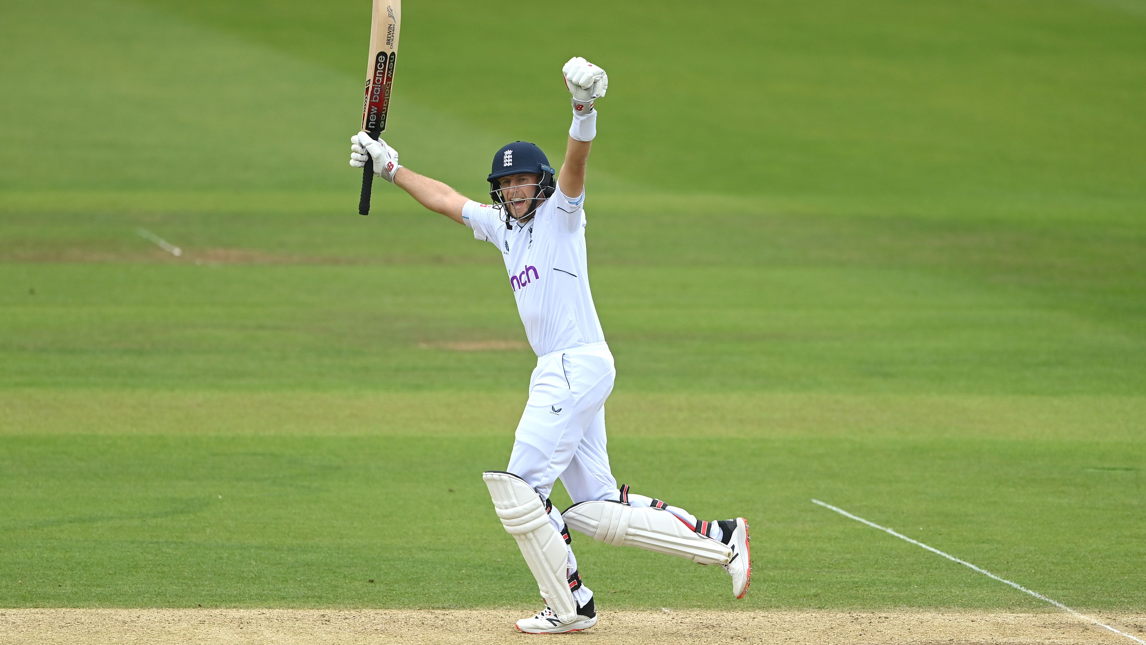 England&#x27;s Joe Root celebrates after scoring the winning runs against New Zealand.