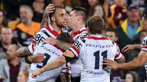 The Roosters' Blake Ferguson celebrates a try. (AAP)