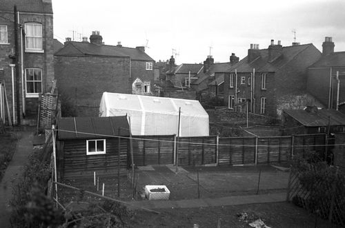 A crime scene photo from the day. The children's mutilated bodies were found on a neighbour's fence.