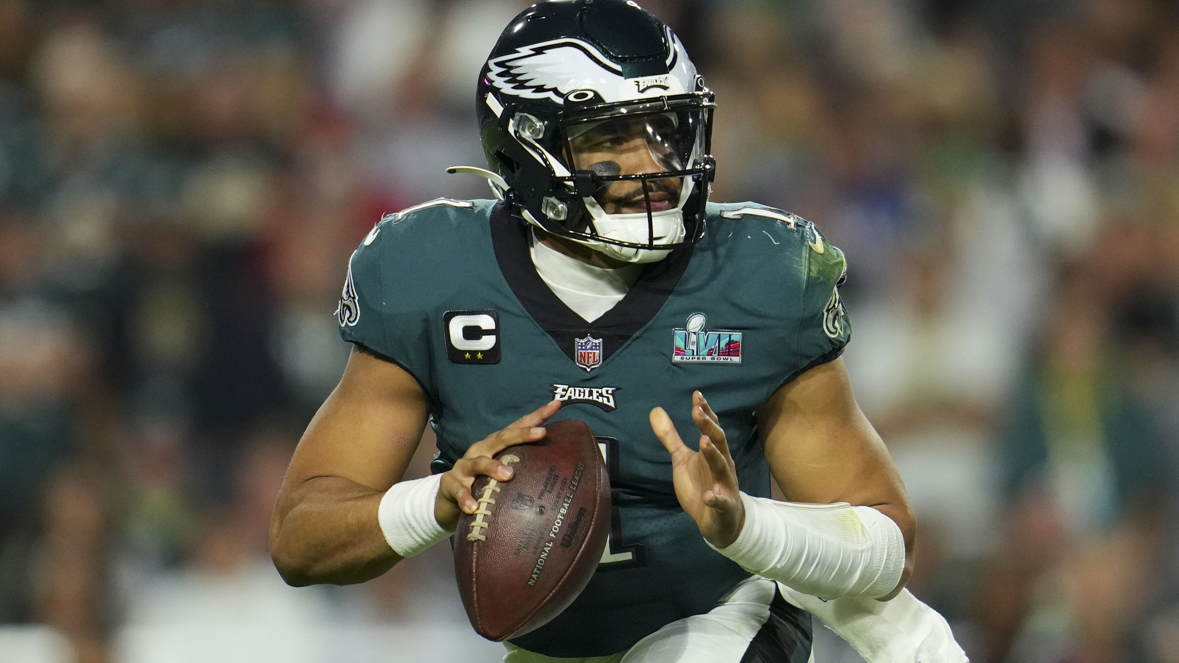 GLENDALE, AZ - FEBRUARY 12: Jalen Hurts #1 of the Philadelphia Eagles runs the ball against the Kansas City Chiefs during the fourth quarter in Super Bowl LVII at State Farm Stadium on February 12, 2023 in Glendale, Arizona. (Photo by Cooper Neill/Getty Images)