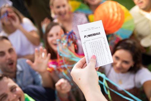 Mystery Sydney shopper wakes up $20 million richer after Powerball win, Victorian syndicate of 20 people each become millionaires in $20 million win