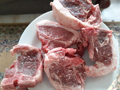 Lamb loins on a plate