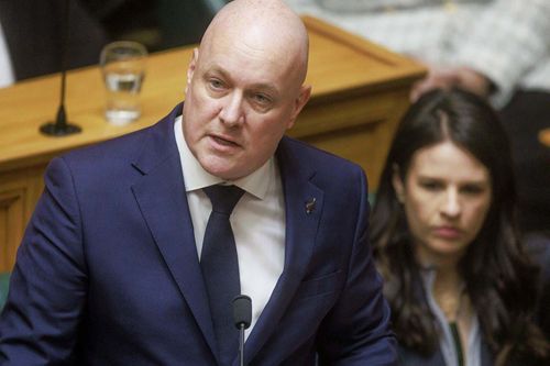 New Zealand's Prime Minister Christopher Luxon gives an apology in Parliament for the abuse of children and vulnerable adults in care, in Wellington, New Zealand.
