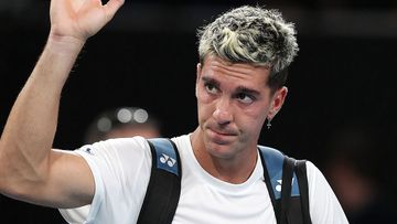 Thanasi Kokkinakis salutes the crowd after he was beaten by Roberto Bautista Agut in the Adelaide International semi final