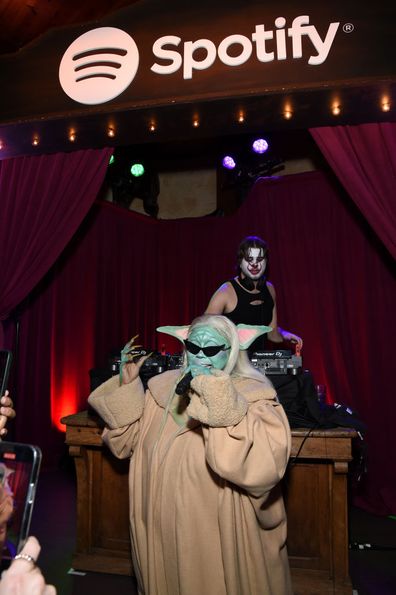 Lizzo crashes Spotify Halloween party 2021, dressed as Grogu, or Baby Yoda from The Mandalorian.
