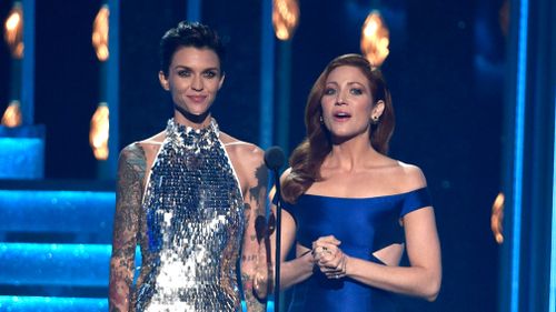 Ruby Rose, left, and Brittany Snow present the award for single of the year at the 51st annual CMA Awards at the Bridgestone Arena in Nashville. (AAP)