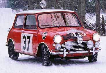 BMC marketed the Mini Cooper under the Morris brand and which other marque?