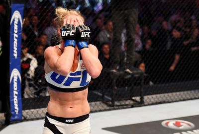 <b>Holly Holm has caused the upset of the year after knocking out the previously undefeated Ronda Rousey in their bantamweight title fight at UFC 193.</b><br/><br/>Holm claimed the victory after delivering a brutal kick to the face early in the second round that forced the referee to call time.<br/><br/>The knockout stunned the crowd at at Etihad Stadium in Melbourne with the previously undefeated Rousey expected to reclaim her crown.<br/><br/>Re-live one of the biggest shocks in UFC history ...<br/><br/><br/><br/>