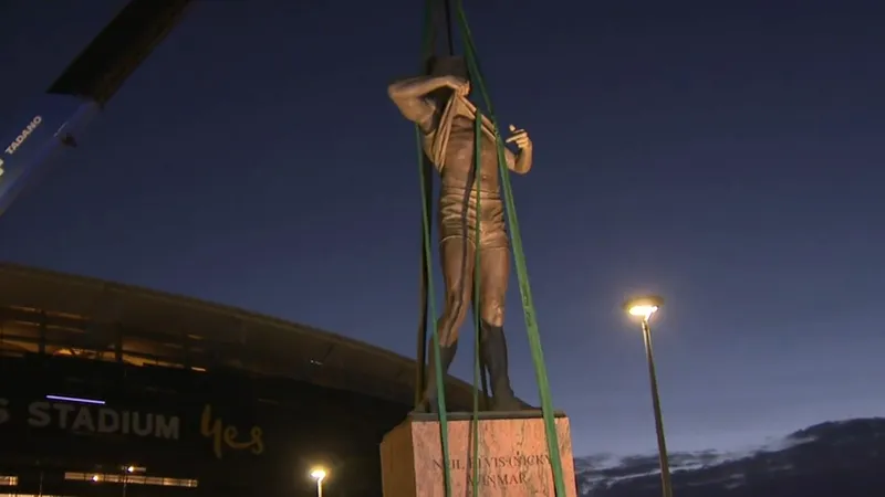 AFL great Nicky Winmar’s statue removed from Optus Stadium | Nine.com.au