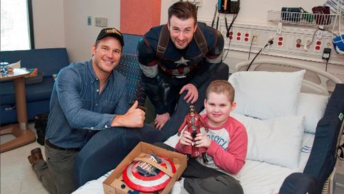 Sick kids get surprise visit from superhero movie stars after Superbowl charity bet