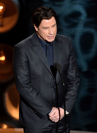 John Travolta onstage during the Oscars at the Dolby Theatre on March 2, 2014 in Hollywood, California.