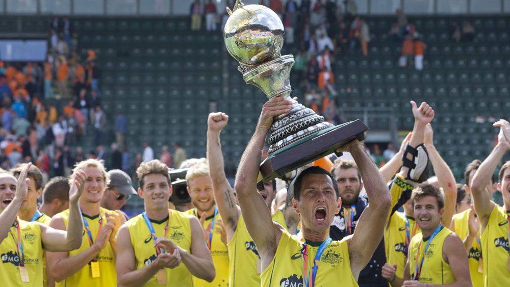 Australia celebrate their Champions Trophy win (AAP)