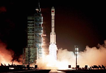 When did China launch its first prototype space station, Tiangong-1?