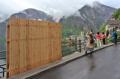 The Austrian village of Hallstatt built a fence to stop selfie takers.